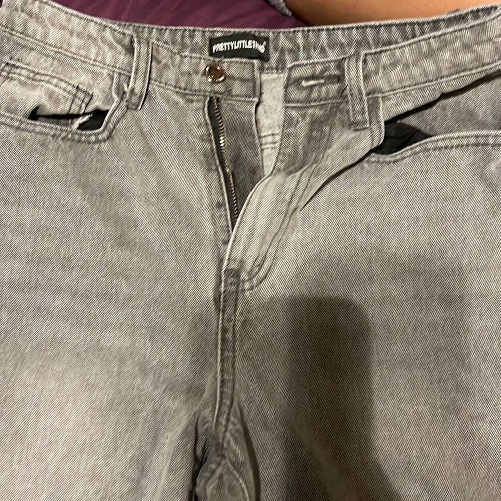 Grey and black ripped jeans nice fit